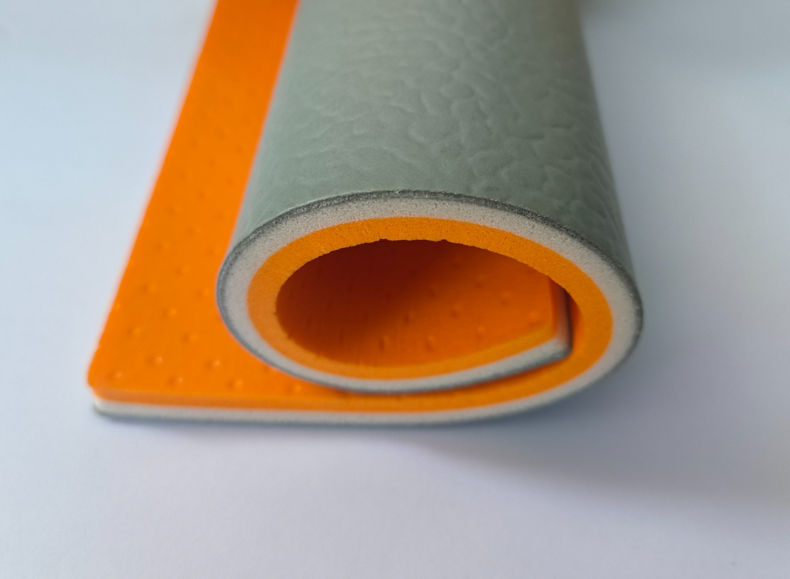 8 mm PVC vinyl roll cross-section in grey showing the layered structure